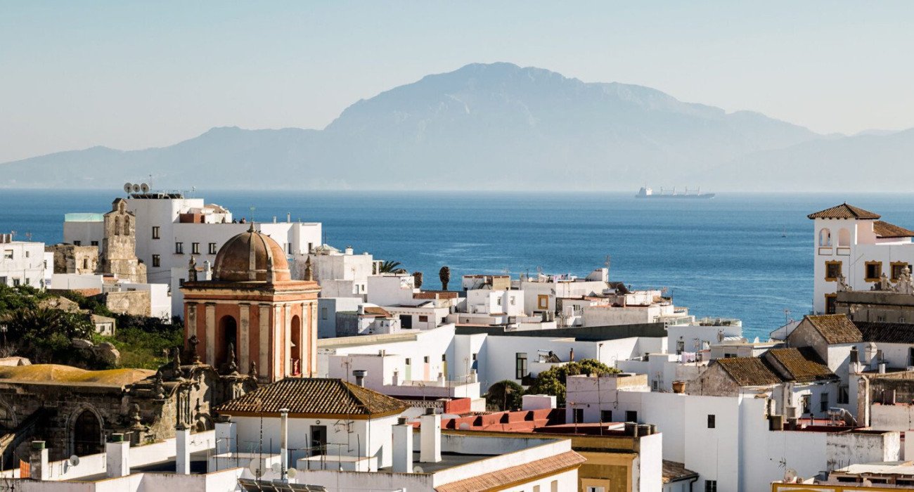 The old town of Tarifa with its white streets and breathtaking views of Mount Musa in Morocco.